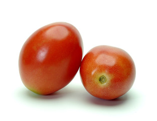 Fototapeta na wymiar Two tomatoes on white background.
