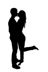 Silhouette of a young couple in love.