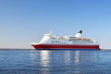 cruise ferry ship sailing in still water