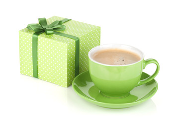 Green coffee cup and gift box with bow