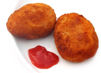 Potato chops with tomato ketchup