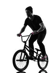 Obraz premium man bmx acrobatic figure silhouette