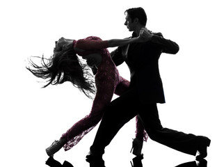 couple man woman ballroom dancers tangoing  silhouette