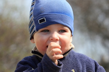 little boy sucking his thumb