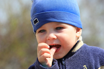 little boy sucking his thumb