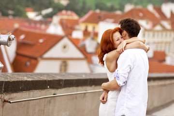 Fototapeta premium Young couple walking in old town of Prague