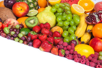 Huge group of fresh fruits isolated on a white background.