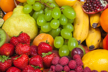 Huge group of fresh fruits isolated on a white background.