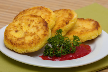 Sweet cheese pancakes on a plate