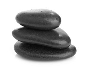 Growing piled up pebbles on a white background