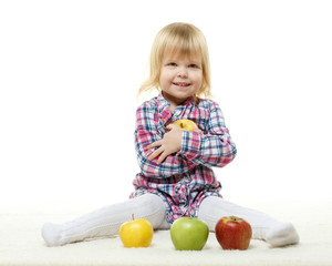 Fototapeta premium Small child with apples.