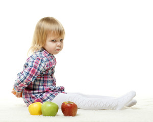 Fototapeta premium Small child with apples.