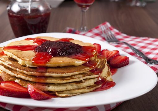 Strawberries jam and pancakes