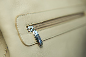 Pocket on white leather