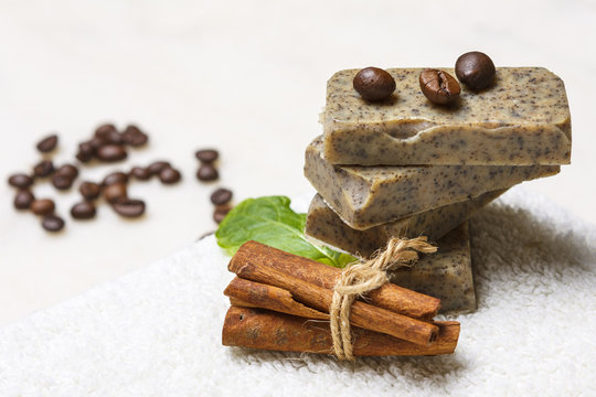 Handmade soap bars with coffee beans, cinnamon and lavender