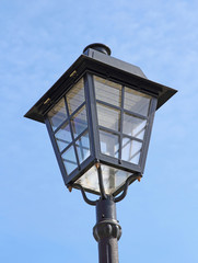 Fototapeta na wymiar street lamp against the background of blue sky