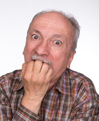 Portrait of a very surprised elderly men