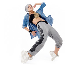 modern style dancer posing on studio background