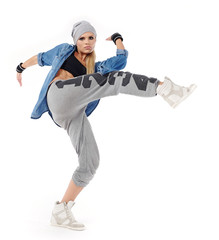 modern style dancer posing on studio background