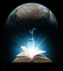 Fototapeta premium Glowing book with earth