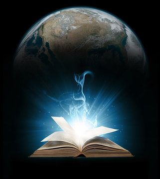 Glowing book with earth