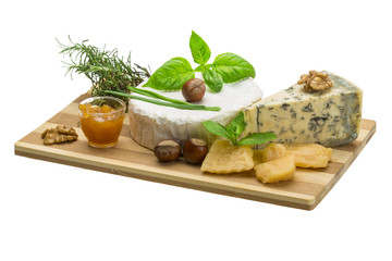 Assorted cheese - brie, dor blue and hard old yellow cheese