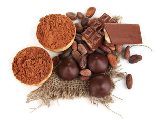 Composition of chocolate sweets and cocoa, isolated on white