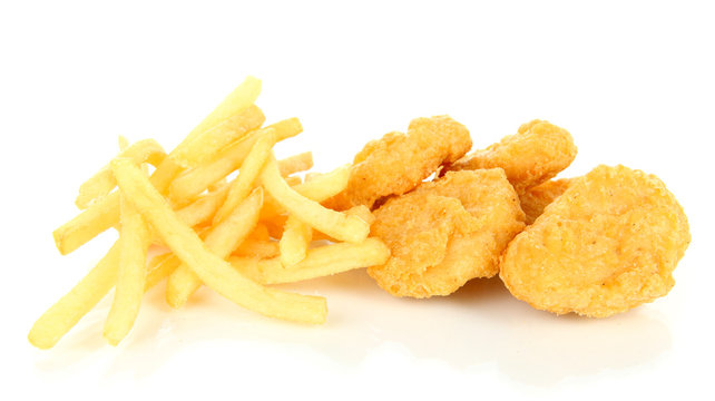 Fried chicken nuggets with french fries isolated on white