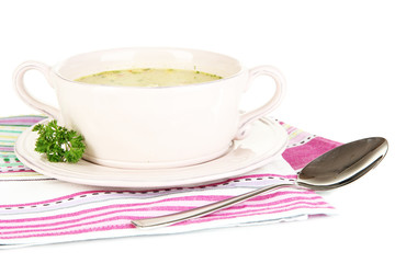 Nourishing soup with vegetables in pan isolated on white