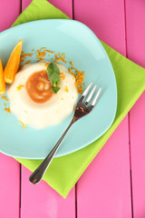 Panna Cotta with orange zest and caramel sauce,