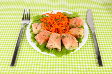 Stuffed cabbage rolls on table