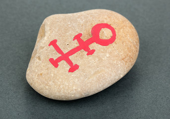 Obraz premium Fortune telling with symbols on stone on grey background