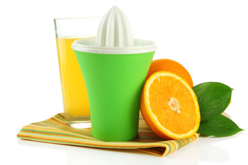 Citrus press, glass of juice and ripe oranges, isolated on