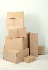 Different cardboard boxes in room