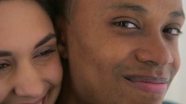 Happy African American and Caucasian couple smiling