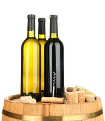 Naklejka premium Wine and corks on barrel isolated on white