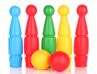 Colorful plastic skittles of toy bowling isolated on white