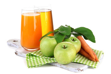 Glasses of juice, apples and carrots, isolated on white