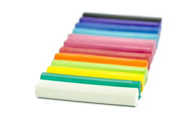 Color children's plasticine on a white background