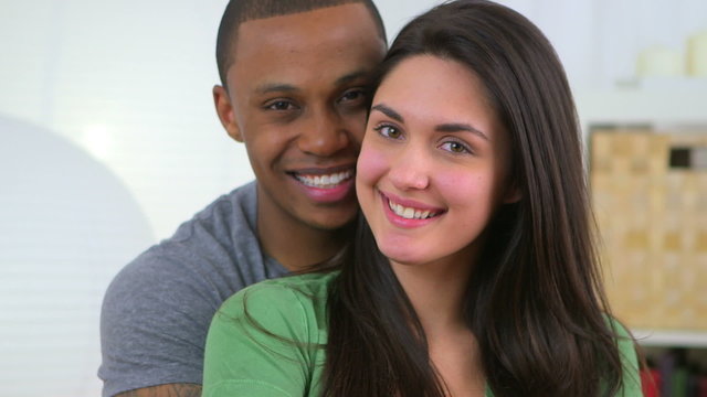 African American and Caucasian Couple smiling together