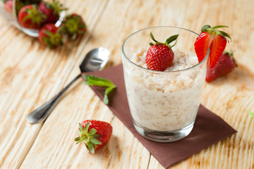 oatmeal porridge for breakfast with strawberries