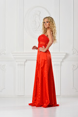 Fototapeta premium beautiful woman in red long dress.