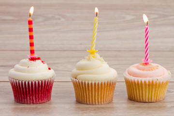 birthday cupcakes on table