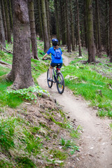 Naklejka premium Healthy lifestyle - teenage girl biking