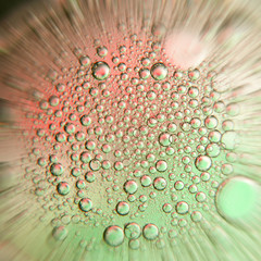 Zoomed oil bubbles on a water surface