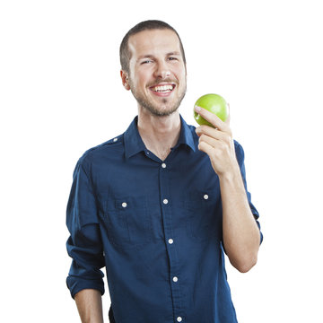 Cheerful Beautiful Man Eating Apple, Isolated Over White Backgro