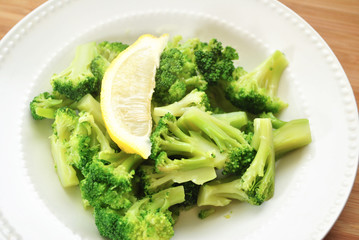 Chopped Broccoli with a Fresh Lemon Slice