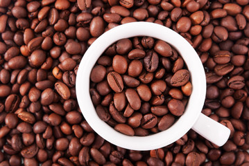 coffee beans and white cup top view