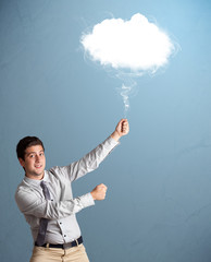 Young man holding cloud