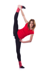 Young gymnast exercising on white